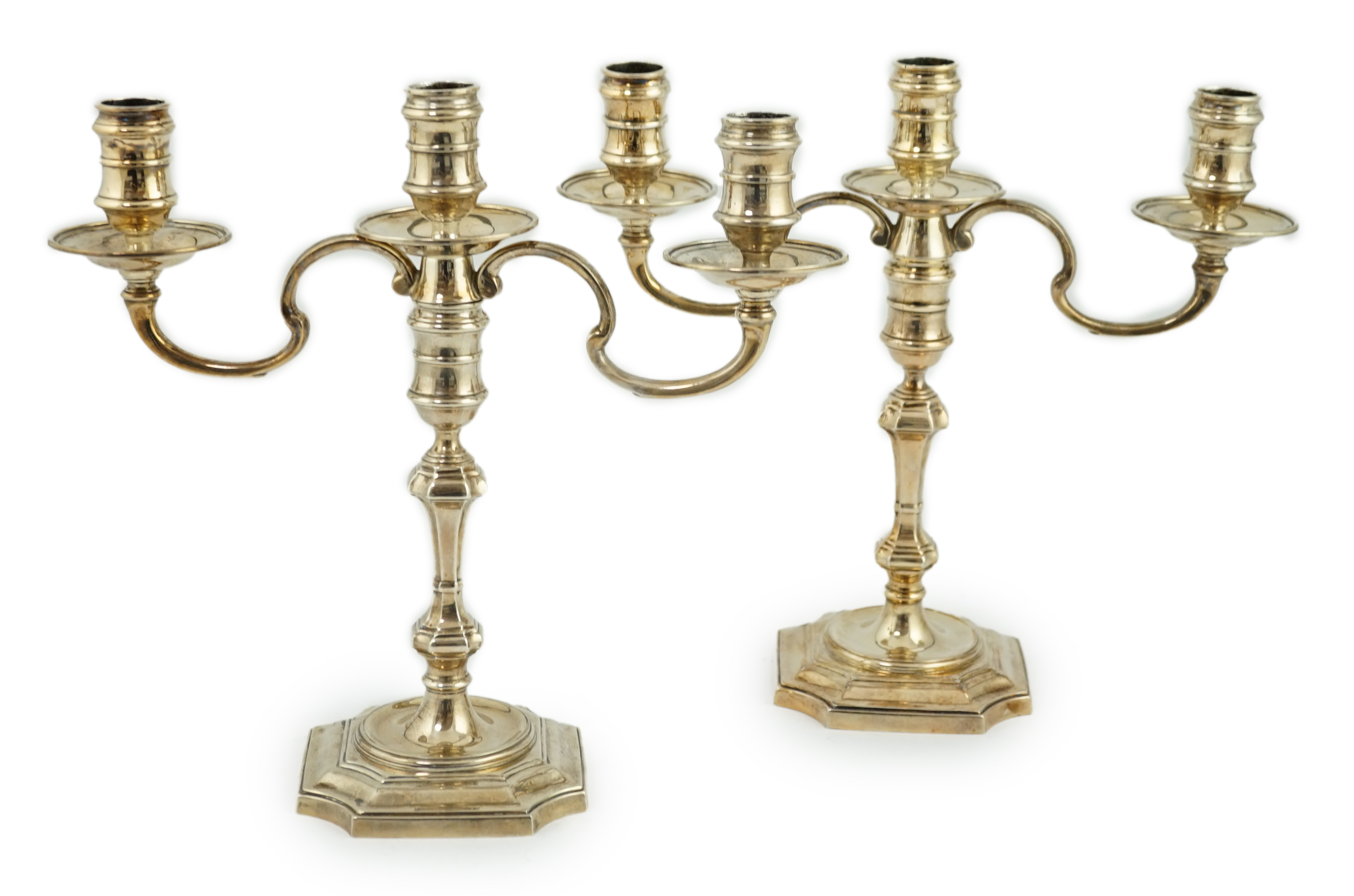 A pair of Queen Elizabeth II silver two branch, three light candelabra, by J.B. Chatterley & Sons Ltd